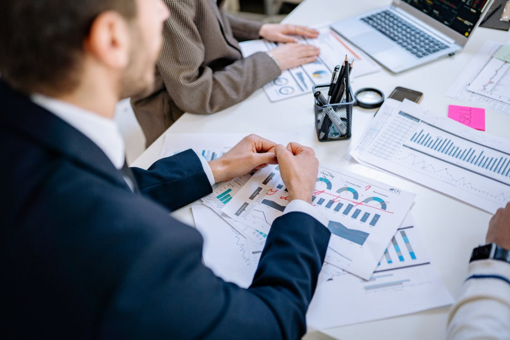 A group of employees working on auditing services