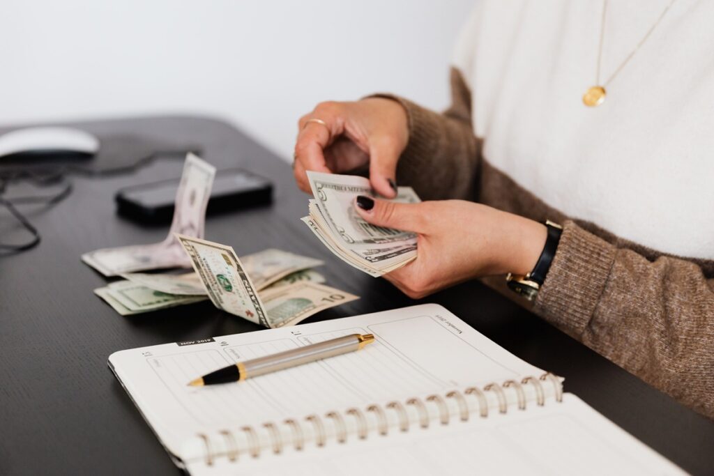 Woman counting dollars