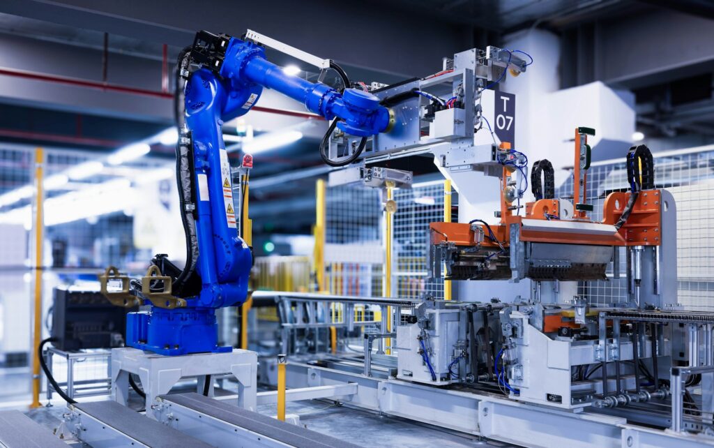 A robot arm working on production in a factory