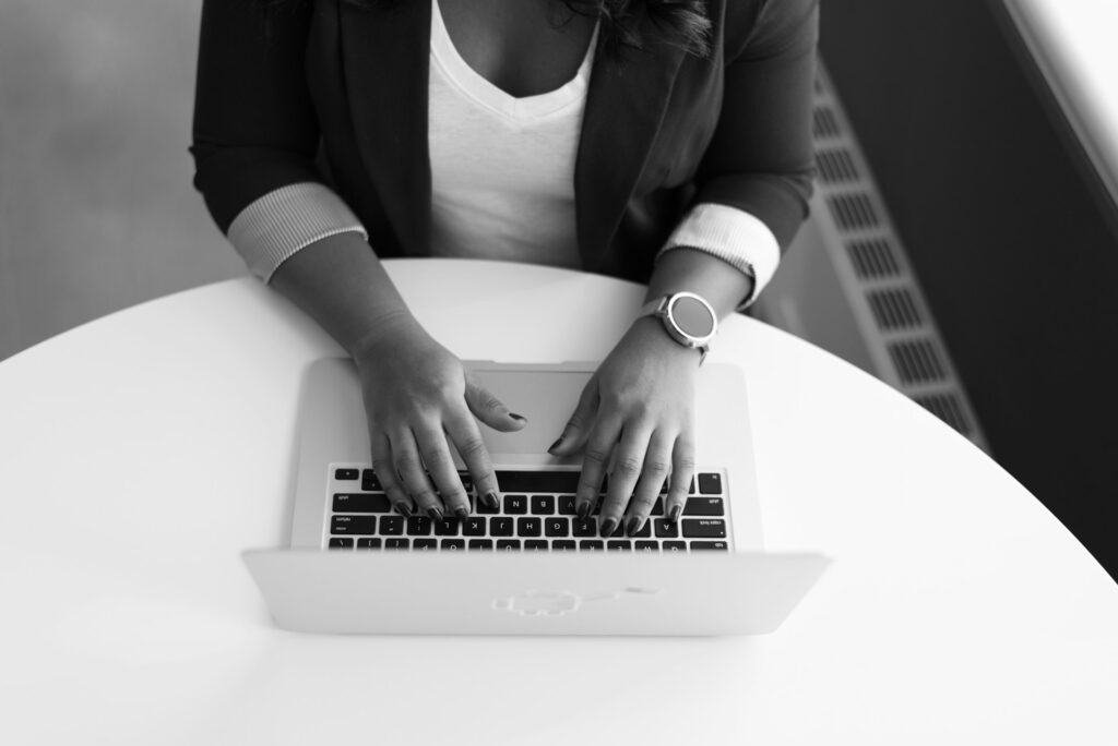 A woman working on a laptop