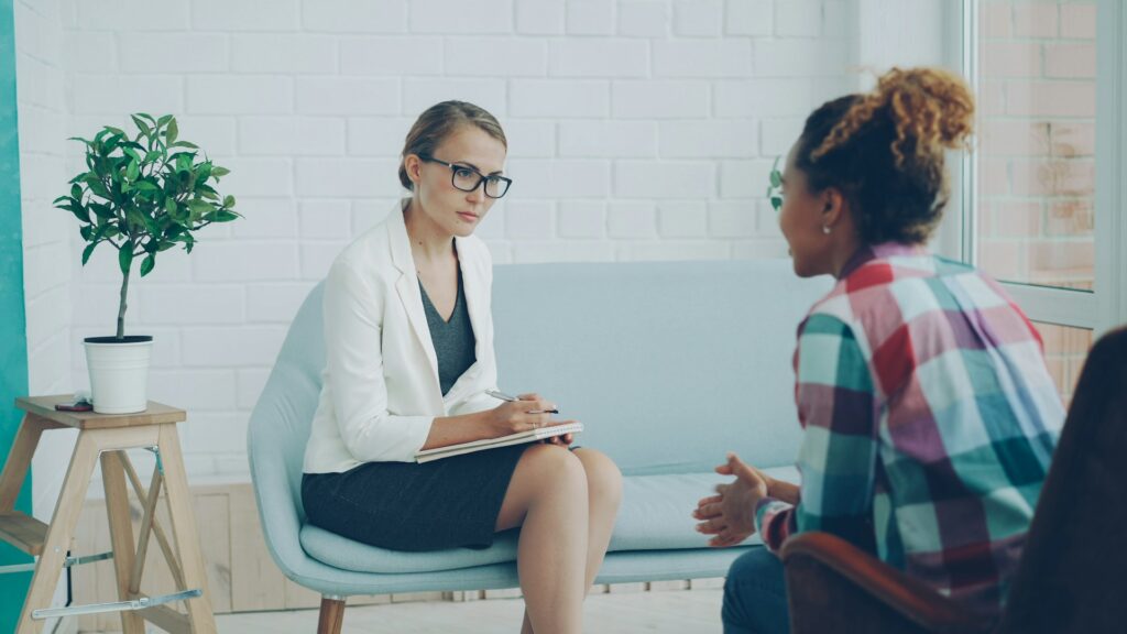Two women talking during therapy