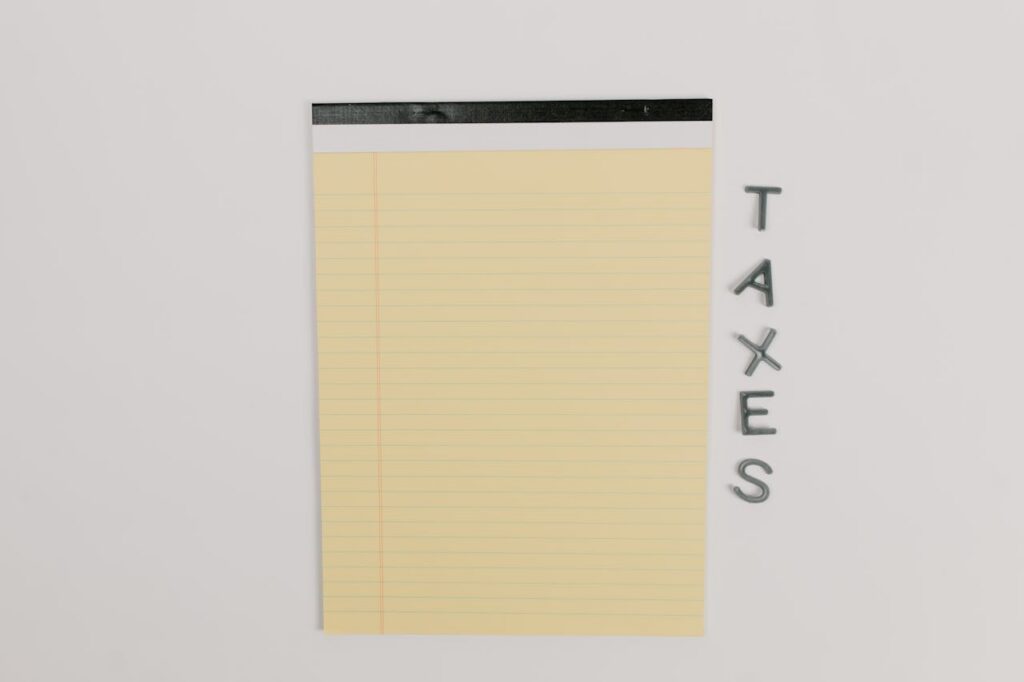 A notebook to keep track of expenses and taxes